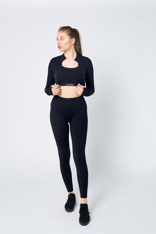 Woman wearing ICONIC Sculpting Leggings in black
